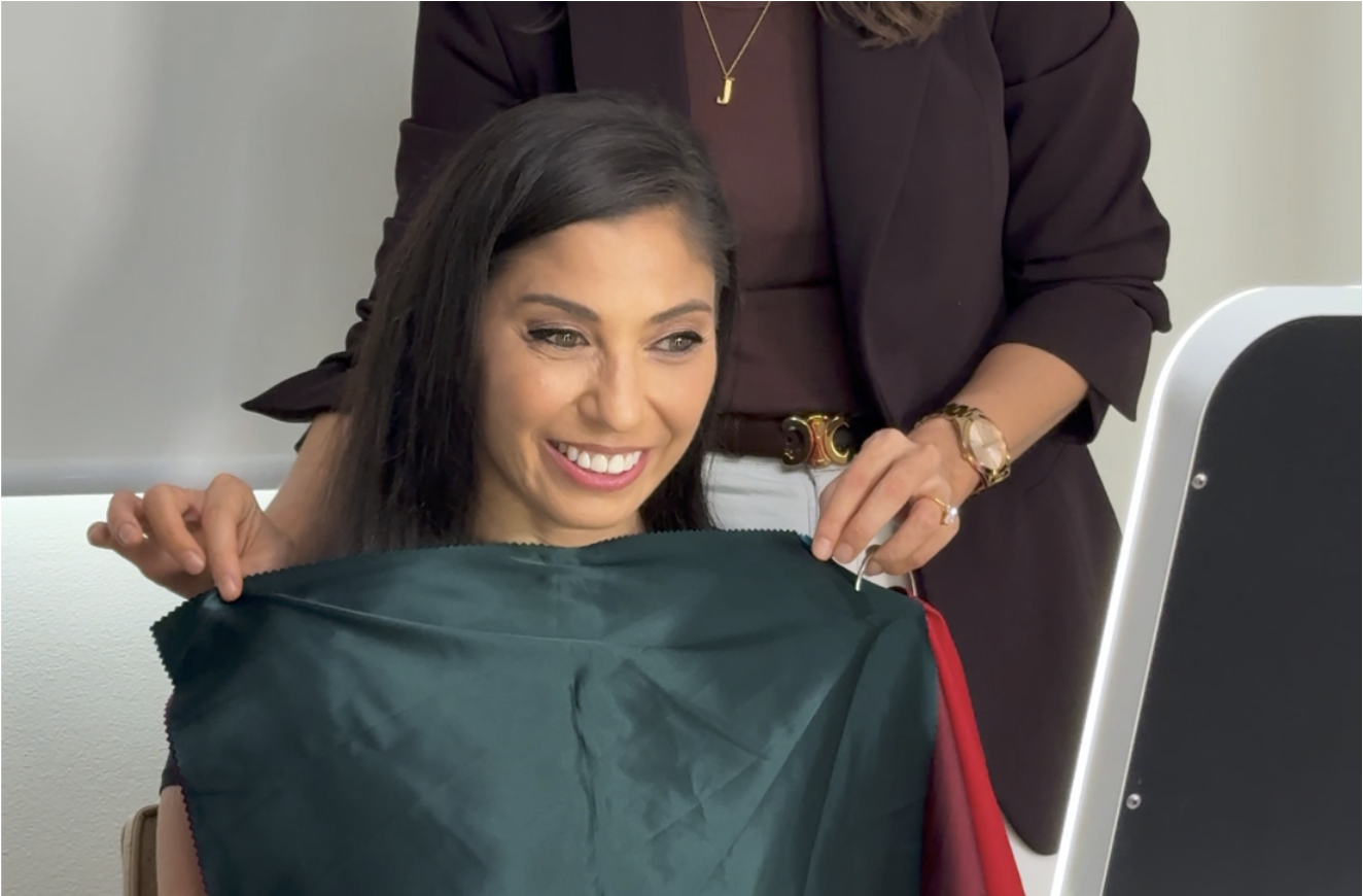 Colour draping session showing deep forest green as one of the client's best harmonising colours